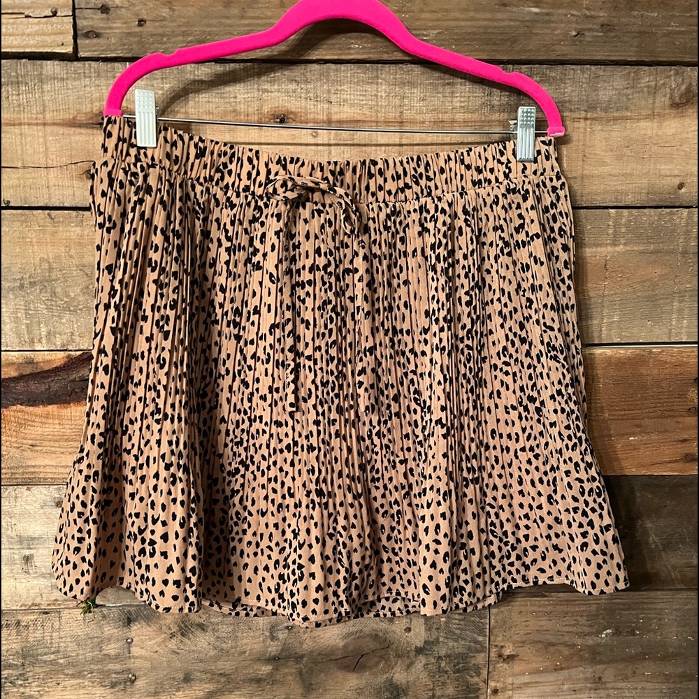 Cheetah print pleated mini skirt. Never worn